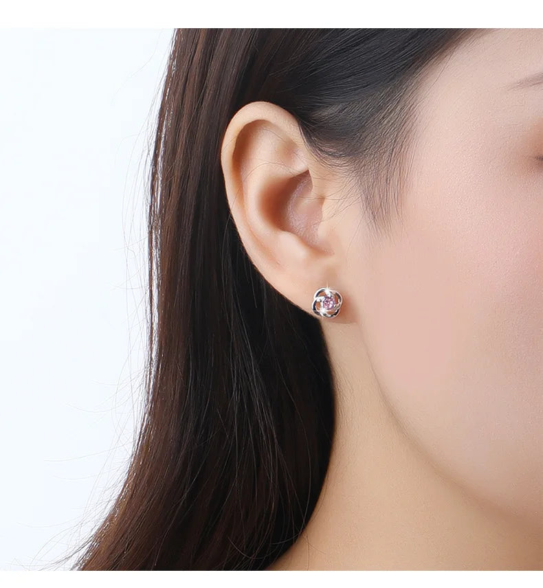 Kinselle Rotating Four-Leaf Clover Zircon Stud Earrings — 925 Sterling Silver